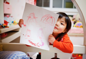 Children happily engaged in a home learning environment
